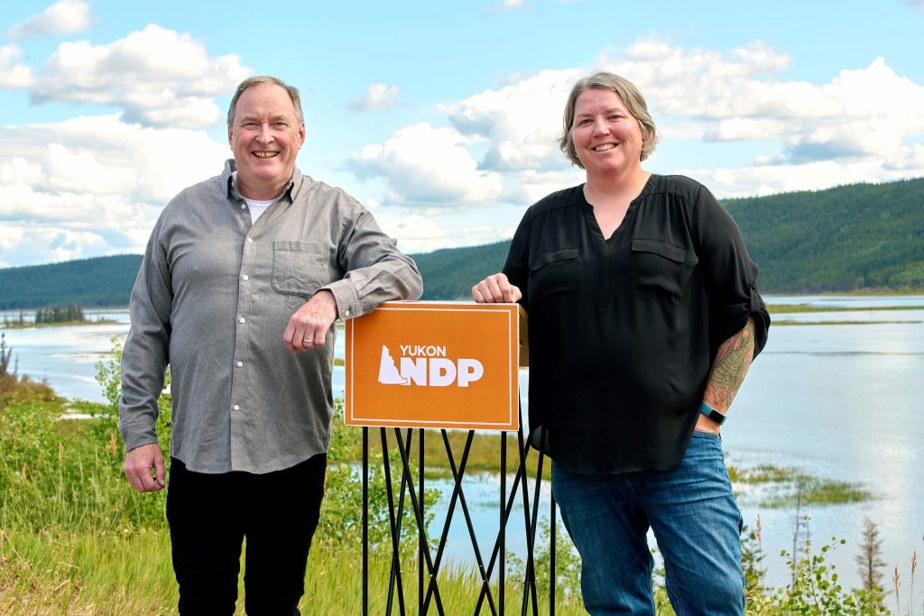 NDP Nomination candidate Kevin Kennedy poses with party leader Kate White near Marsh Lake, Yukon